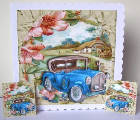 Blue Vintage Car with Flowers and a Cottage 8x8 by Margaret McCartney