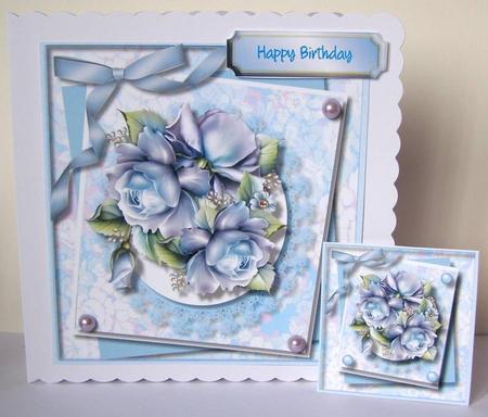 Brautiful Blue Roses on Lace  by Margaret McCartney