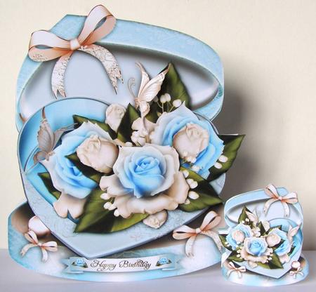 Soft Blue Gift Box with Roses by Margaret McCartney