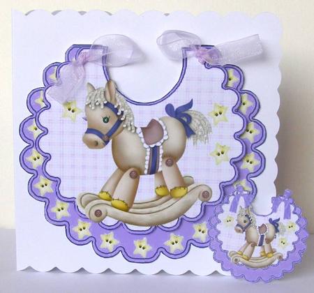 Lovely Rocking Horse with Stars on a Purple Bib by Margaret McCartney