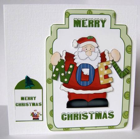 Santa with Noel Banner by Margaret McCartney