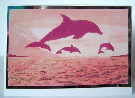 Dolphins at Sunset by Margaret McCartney