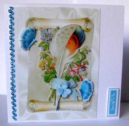 Feather and Blue Bow on a Scroll by Margaret McCartney