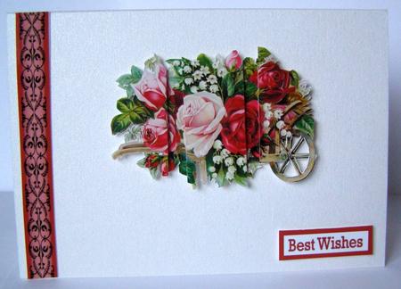 Wheelbarrow of Roses by Margaret McCartney
