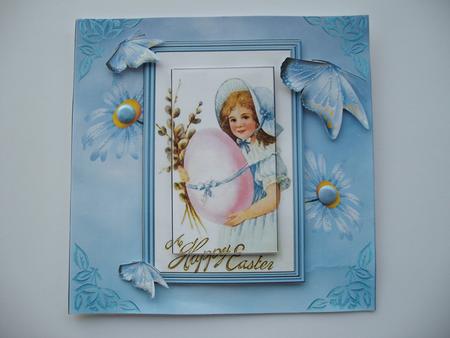 A Happy Easter Girl with Blue Daisies by Margaret Mullan