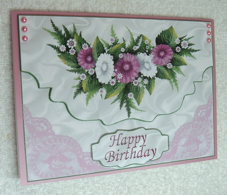 Pretty border of pink flowers on envelope A5 by Margaret Scott