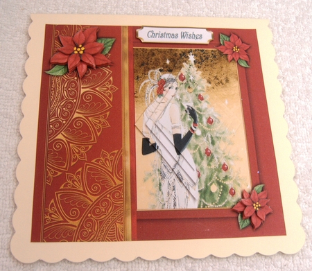 Christmas by the tree by Margaret Scott