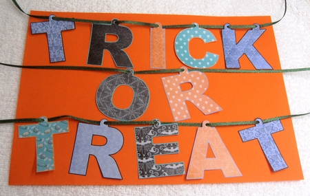 Halloween Trick Or Treat Bunting by Margaret Scott