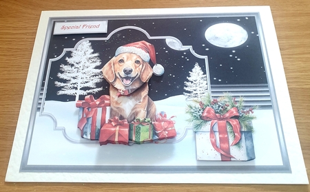 Dog in Santa hat and gifts A5 card by Margaret Scott