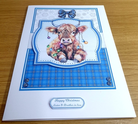 CHRISTMAS LIGHT COWS by Margaret Scott