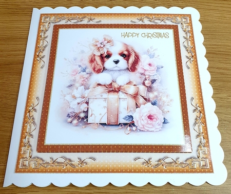 Christmas Cavalier Puppy by Margaret Scott