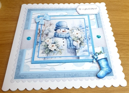 Snowman in Blue by Margaret Scott