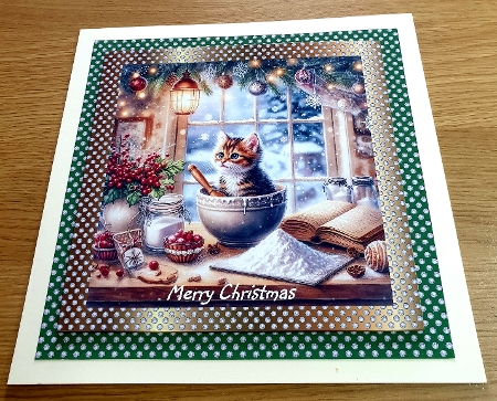 Christmas Cooking Kitten  by Margaret Scott