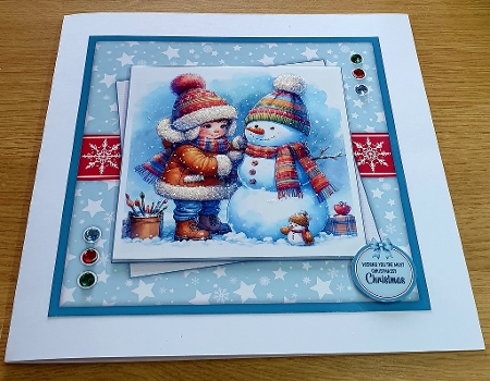 Playing in the snow by Margaret Scott
