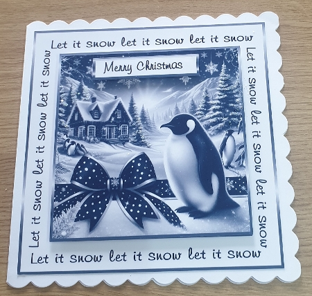 Let it snow black and white pengins by Margaret Scott