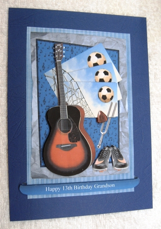Guitar & Football by Margaret Scott
