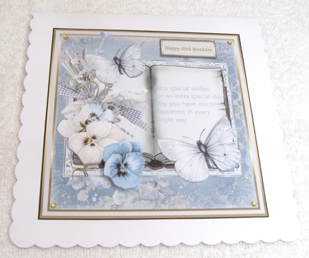 Blue and white pansy  by Margaret Scott