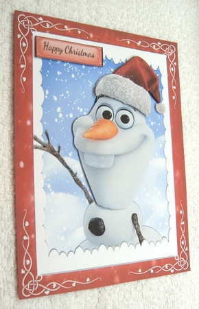 Snowman With Santa Hat by Margaret Scott