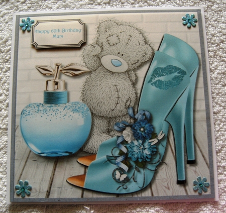 Tatty teddy with shoes and perfume by Margaret Scott