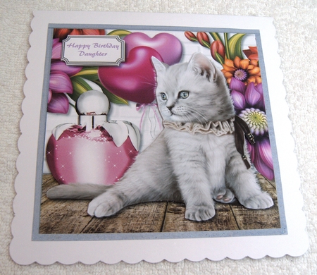 Kitten with flowers perfume and balloons in vibrant colours by Margaret Scott