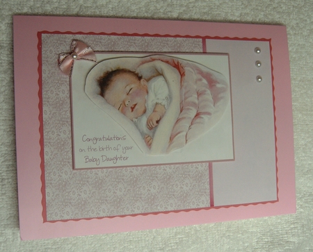 Baby in pink by Margaret Scott