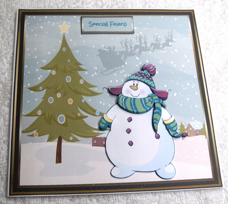 Snowman sees Santa! by Margaret Scott