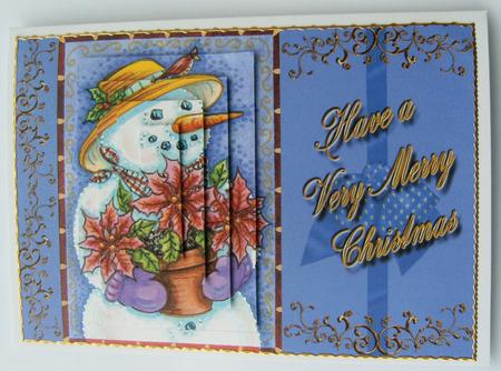Lovely Snowman Carrying Poinsettia by Margaret Scott