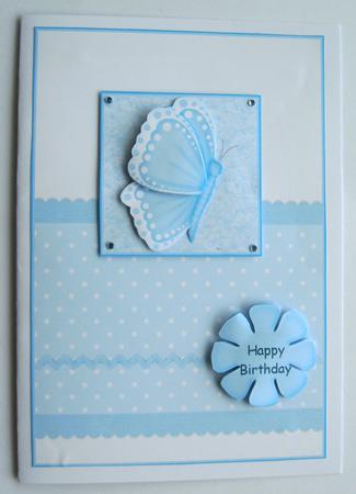 Ric-rac, Dots & Butterfly in Pastel Blue by Margaret Scott
