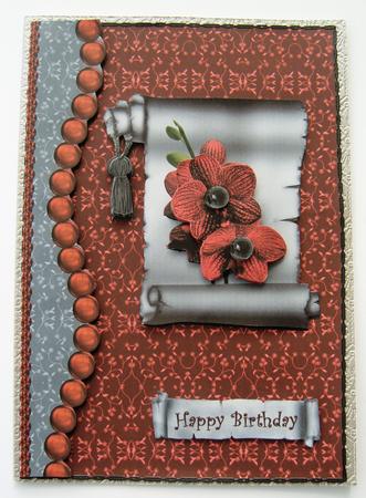 Jewelled Red Flowers on a Black Scroll by Margaret Scott