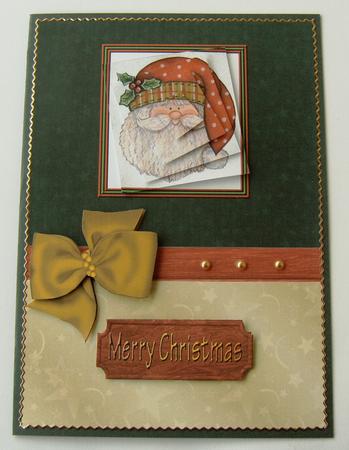Twisted Santa Pyramid Card Front by Margaret Scott