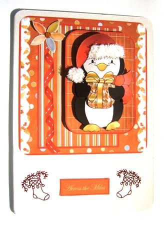 Penguin at Christmas by Margaret Scott