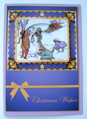 Kids Building a Snowman Card Front by Margaret Scott