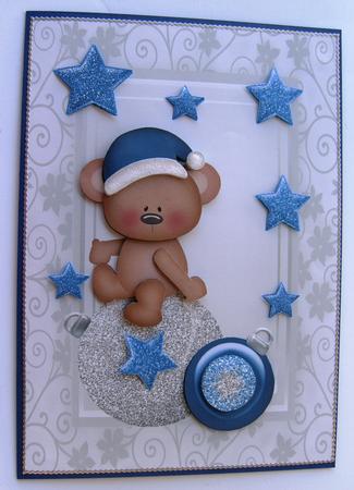 Little Brown Santa Bear Sat on Baubles by Margaret Scott