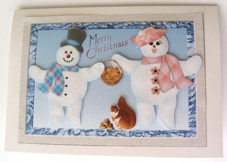 Snowmen Feeding Squirrel by Margaret Scott