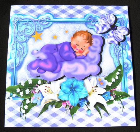 Sweet Baby Girl Sleeping on a Fluffy Cloud with Flowers by Margaret Scott