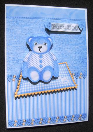 Baby Boy Teddy on Cushion by Margaret Scott