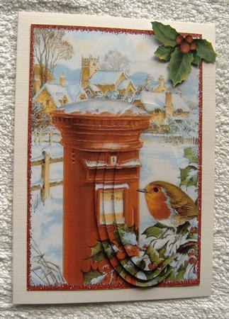 Cute Robin in Snow Village Oval Pyramids by Margaret Scott