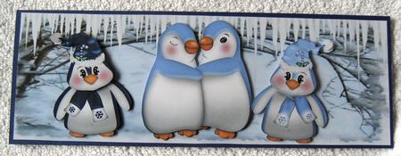 Family of Cute Penguins in Blue in the Snow Dl by Margaret Scott