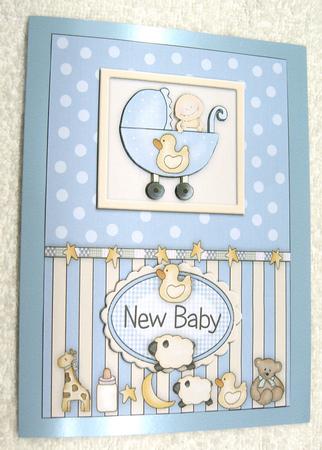 Blue New Baby Pram and Toys Topper by Margaret Scott