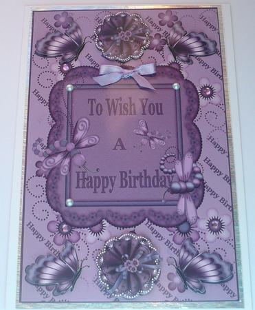 Purple Flowers & Butterflies Card Front by Margaret Skinner