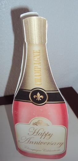 Large Dl Anniversary Champagne Bottle Shaped Card by Margaret Swaby