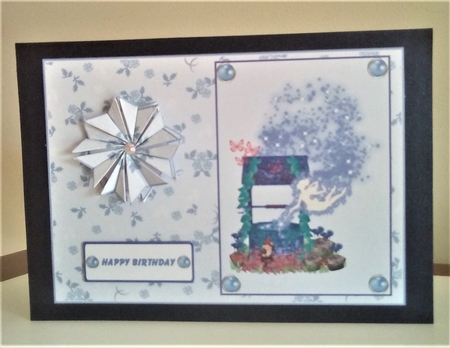 Blue A5 fairy wishing well card front. by Margaret Swann