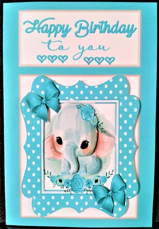 Sweet little ele in blue/white polkadot 7x7 frame with bows by Margarette Blakeborough