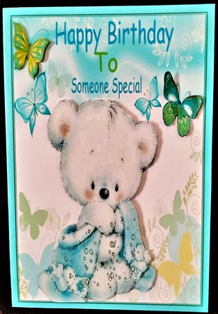 Cute little teddy with a blue blanket and butterflies 8x8 by Margarette Blakeborough