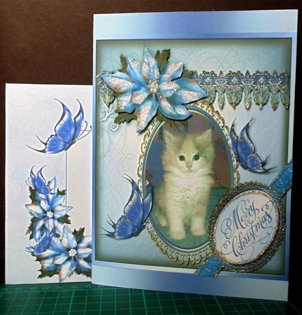 Kitten, Butterflies and Poinsettias 8x8 Inches by Margarette Blakeborough