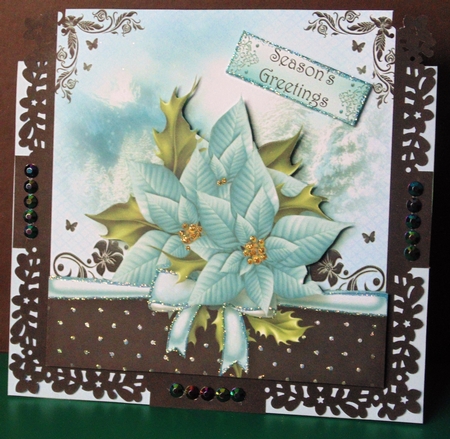 The Christmas Gift of Blue Poinsettias by Margarette Blakeborough