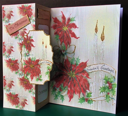 Poinsettia and holly by Margarette Blakeborough