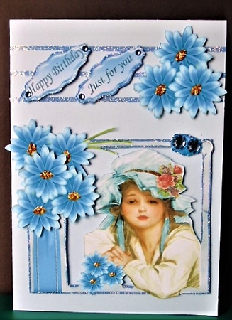 pretty vintage lady in bonnet with blue flowers by Margarette Blakeborough