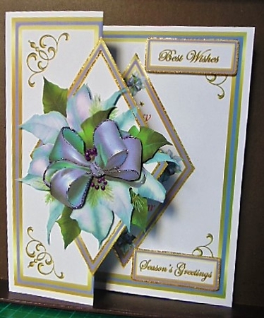Diamond fold back Blue Poinsettias by Margarette Blakeborough