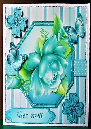 pretty blue roses in stripe/polkadot frame with bows and butterflies 8x8 by Margarette Blakeborough